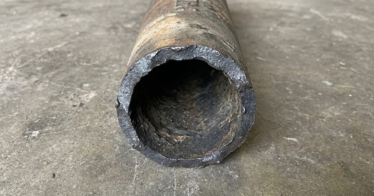 Corroded cast iron pipe section